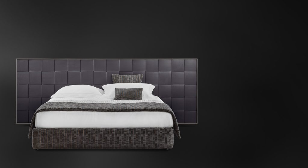 bed with large backrest engraved in macro woven wood pattern and upholstered in black leather