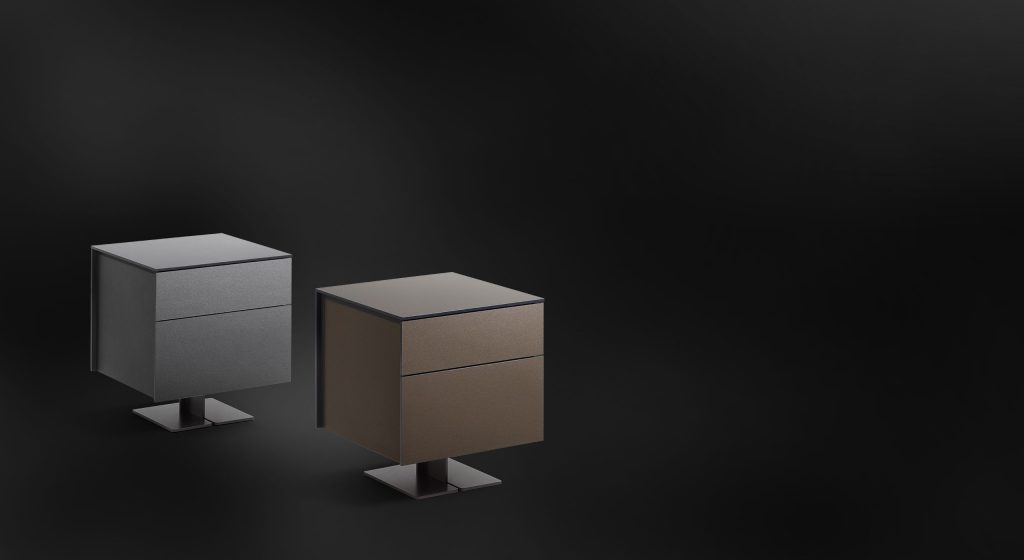 Two nightstand with central curved metal foot and drawers made of lacquered wood in a gray and brown tone on a black background