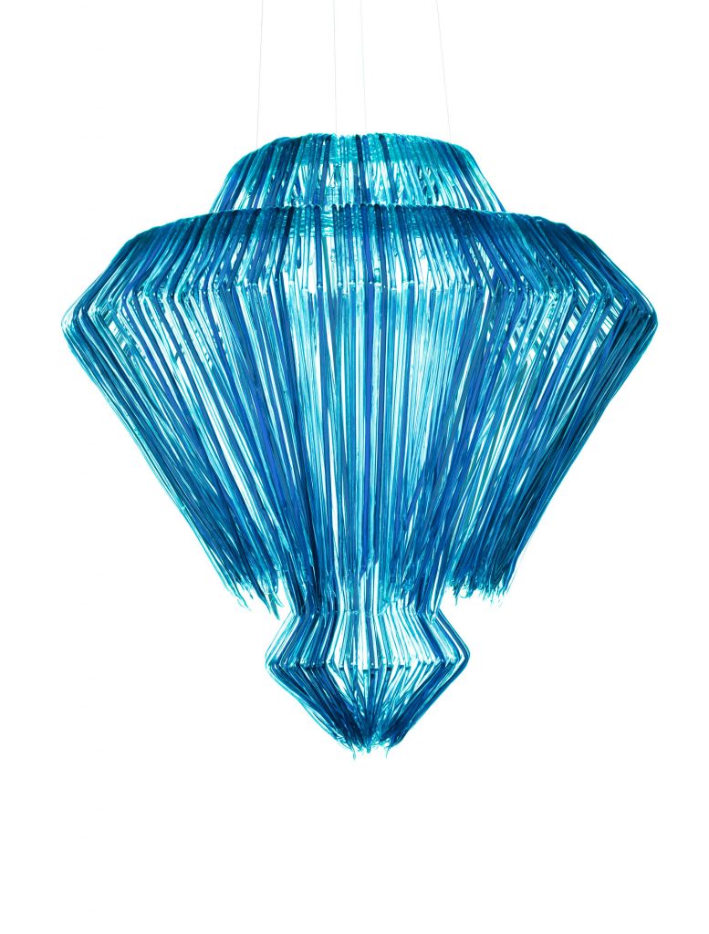 lamp made of several thin vertical strips in a blue color tone on a white background