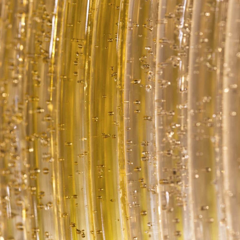 vertical lamp strips made in a white tone with a gold finish