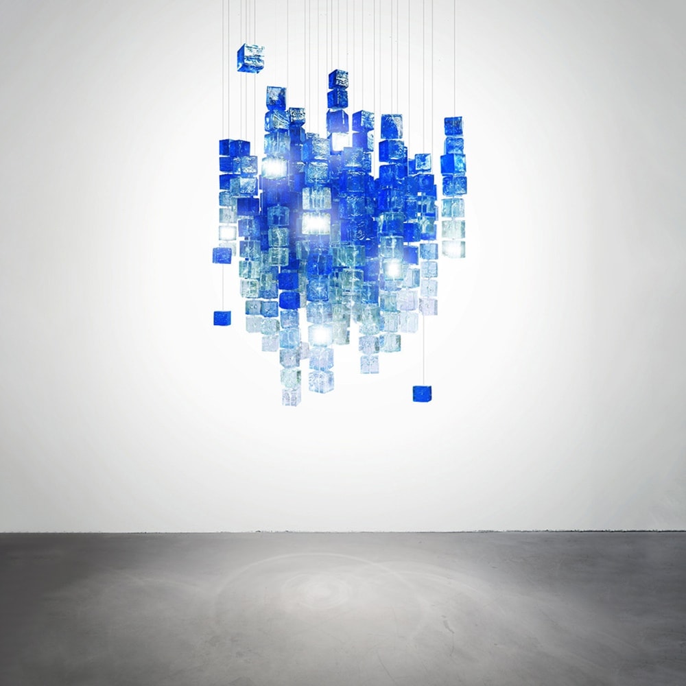 chandeliers made of polycarbonate cubes in a tone of blue with white on a white background