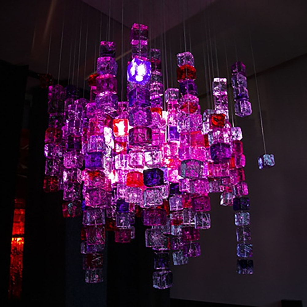 chandeliers made of polycarbonate cubes in a tone of pink with purple on a white background