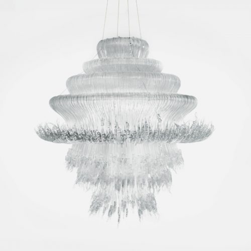 Handcrafted lamp made from thick strips of methacrylate in a white tone on a white background