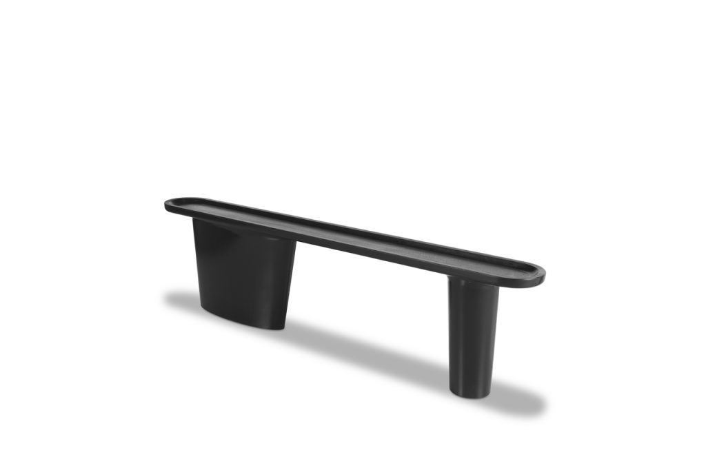long, thin and fine console made of ash wood in a black color tone on a white background