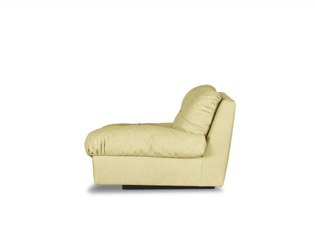 padded armchair made of leather in a yellow tone on a white background