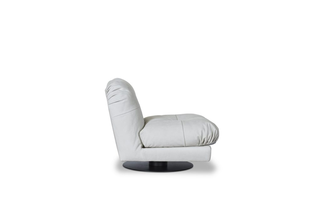 Swivel armchair made of leather of a white color tone with foam on a white background