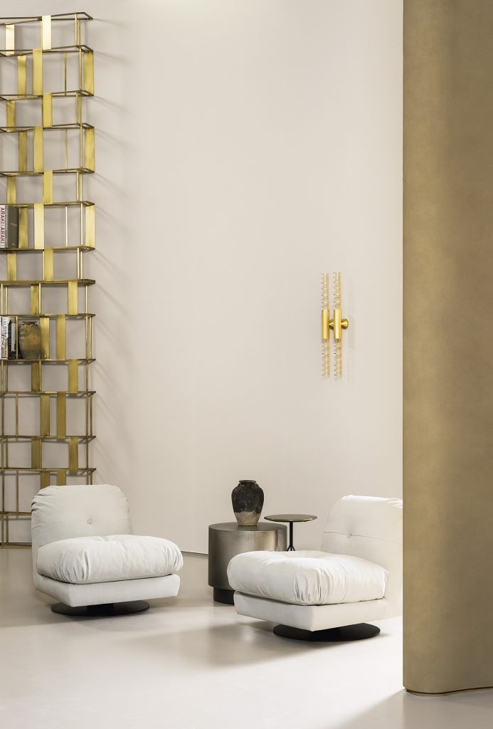 two Swivel armchair made of leather of a white color tone with foam in a living room