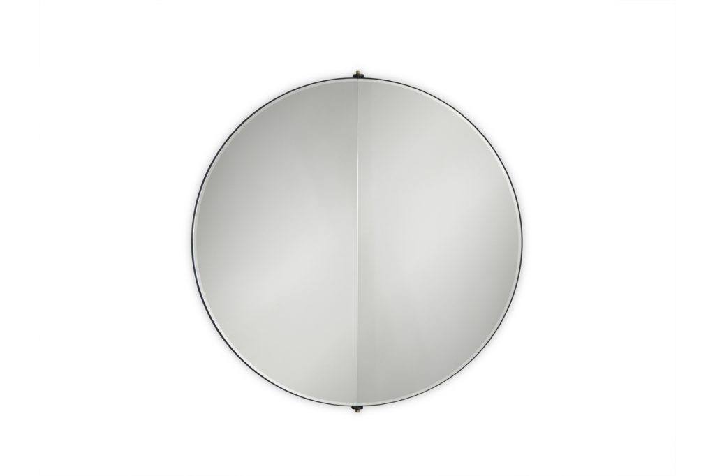 Mirror made of reflective glass in the shape of a circle on a white background
