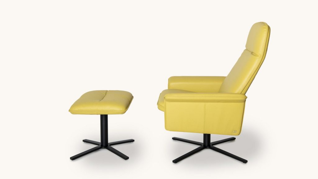 a stool and a high-back desk chair covered in yellow-colored leather on a white background