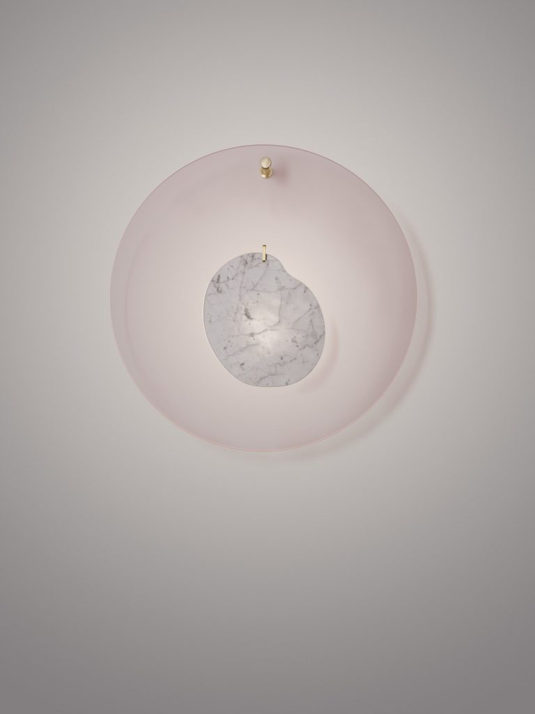 ceiling lamp made of marble and transparent disc in a pink and gray tone on a white background