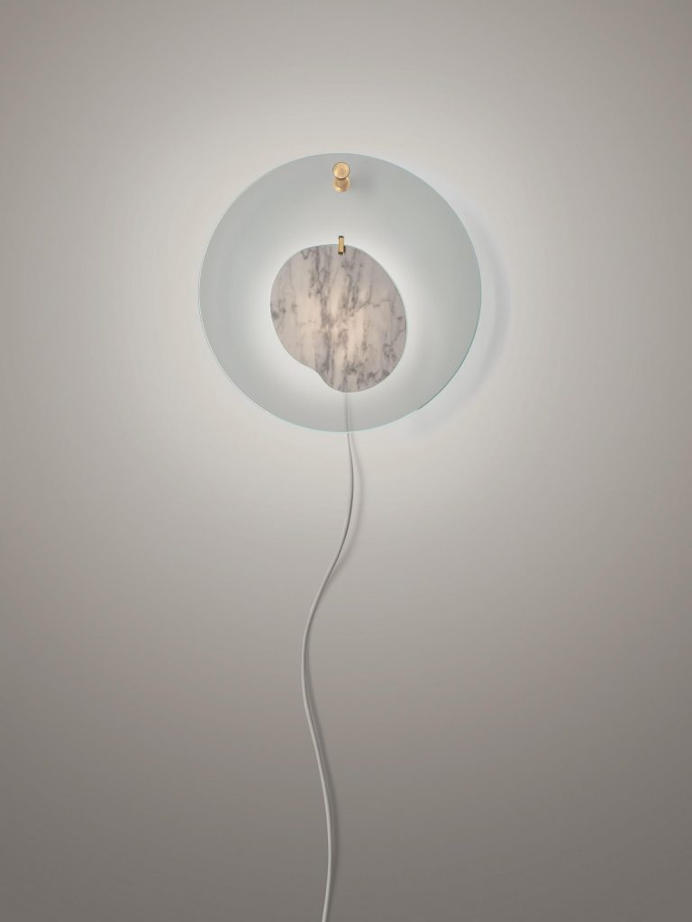 ceiling lamp made of marble and transparent disc in a ligth blue and gray tone on a white background