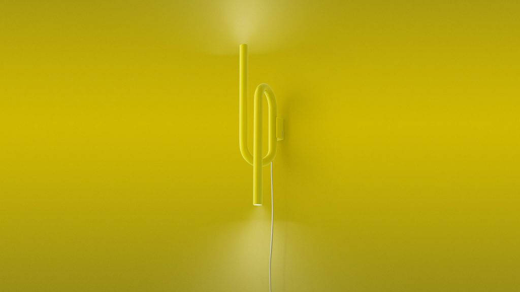 wall lamp emits symmetrical light in a yellow tone on a yellow background