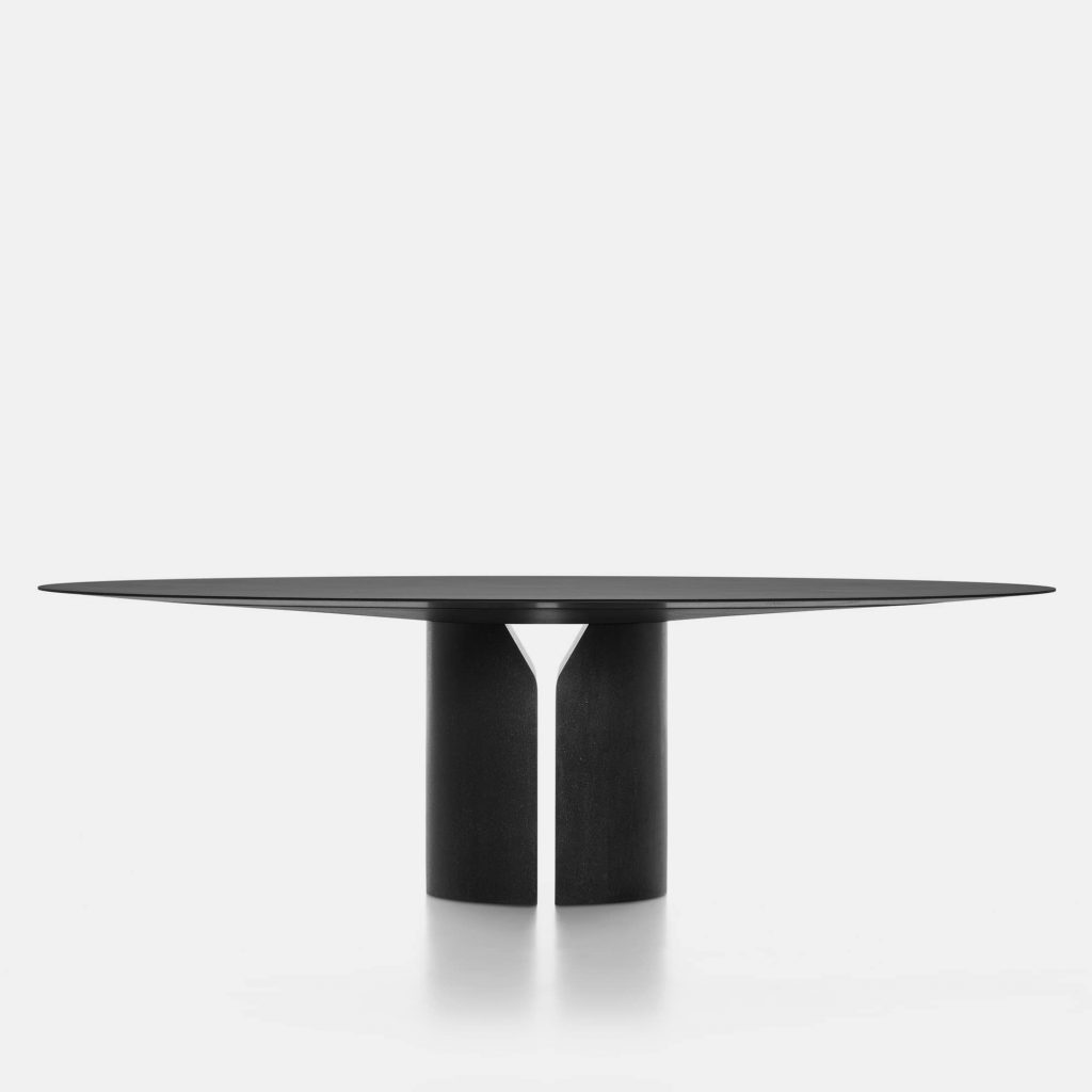 round table made of ebony throughout its structure with an opening in the middle of the base in a black tone