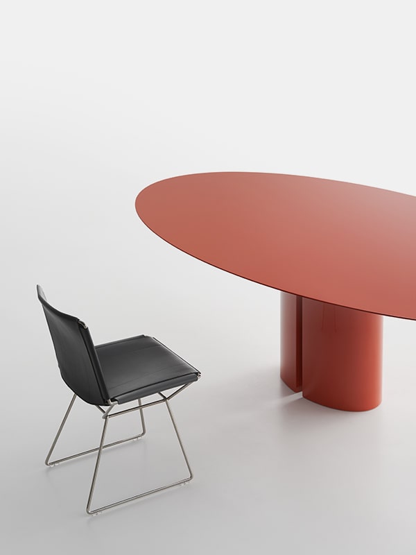 table made of rebuilt red ebony with opening in the middle of the base on a white background