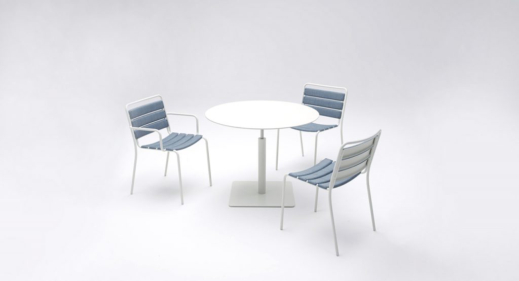 Three stools made with a stainless steel base and 