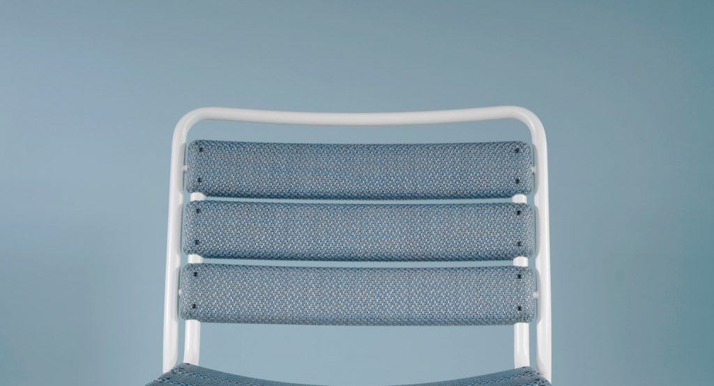 chair made of steel and diade fabric in a blue color tone on a white background
