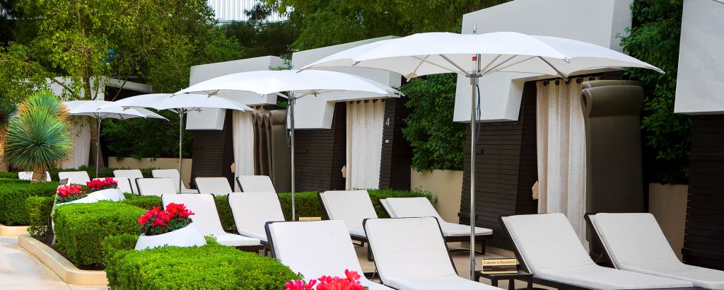 four geometric shaped umbrella made of metal and fabric in a white tone