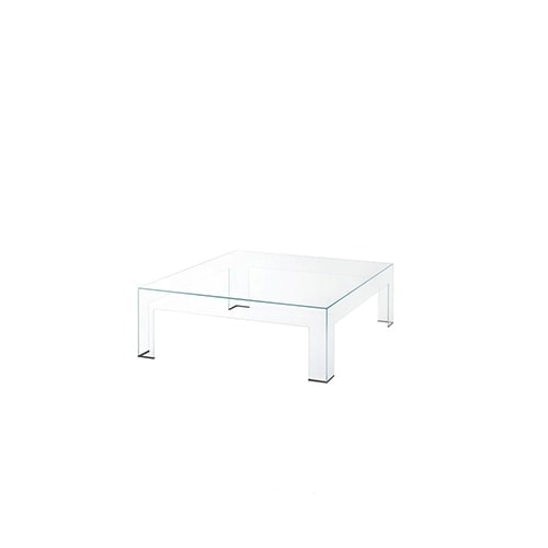 low table composed of transparent tempered glass plates on a white background