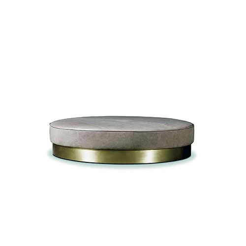 otama made of satin brass base upholstered in light gray suede leather on a white background