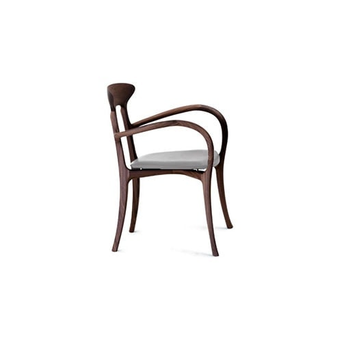 ruched dining chair made of walnut wood base and upholstered in white leather