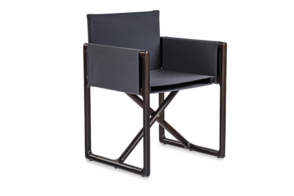 dining chair inspired by director's chairs structure in black leather and steel base on a white background