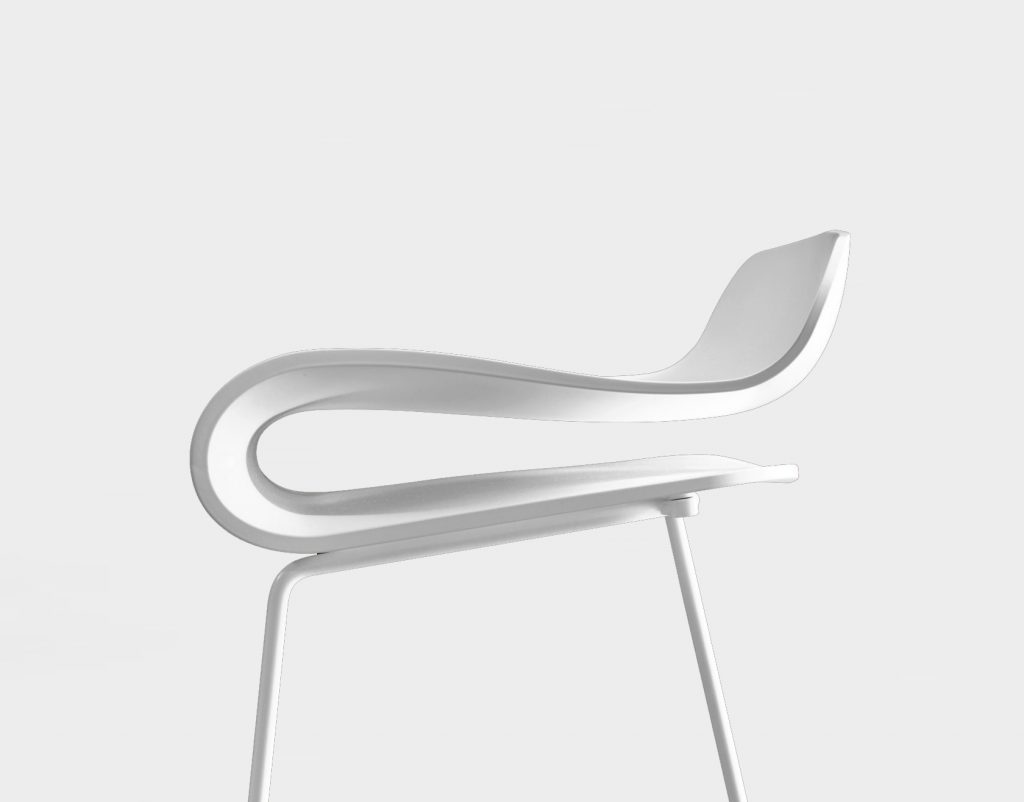bent wooden chair made from wood in an white tone on a white background
