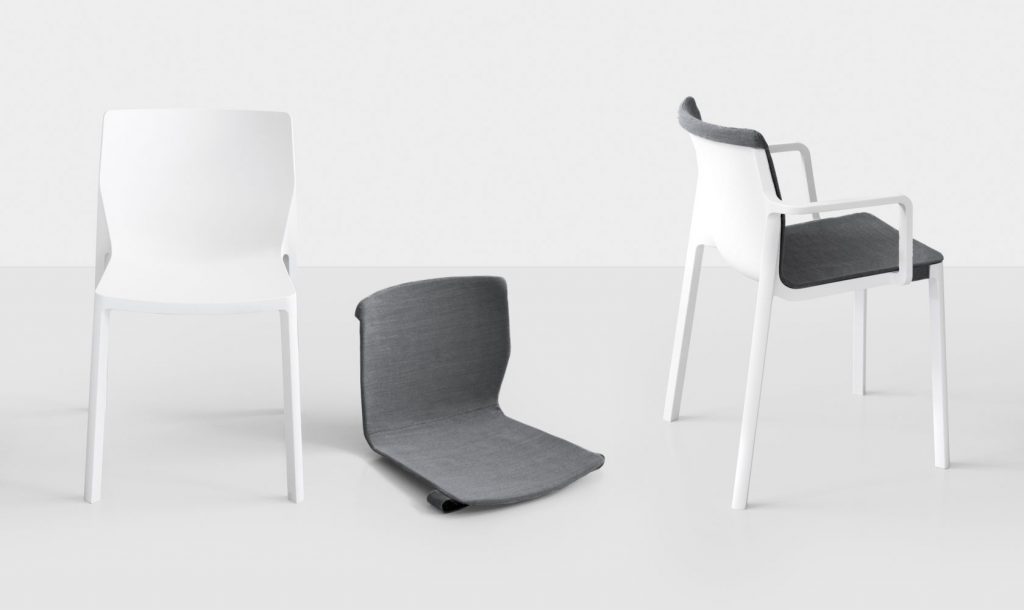 chairs made of molded polypropylene and removable cushions in a tone of white and gray