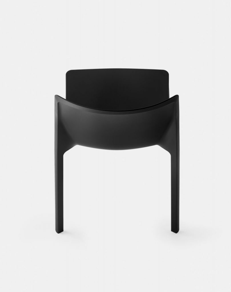 chair made from molded polypropylene in a matte black tone on a white background
