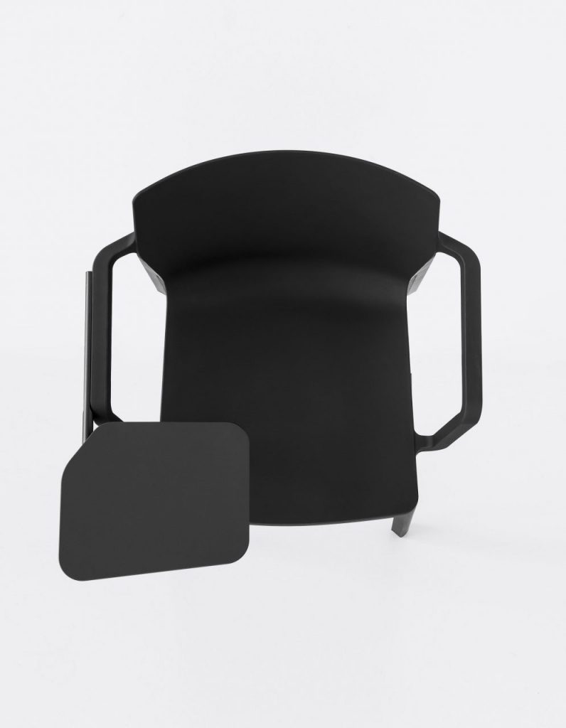 chair made from molded polypropylene in a matte black tone on a white background