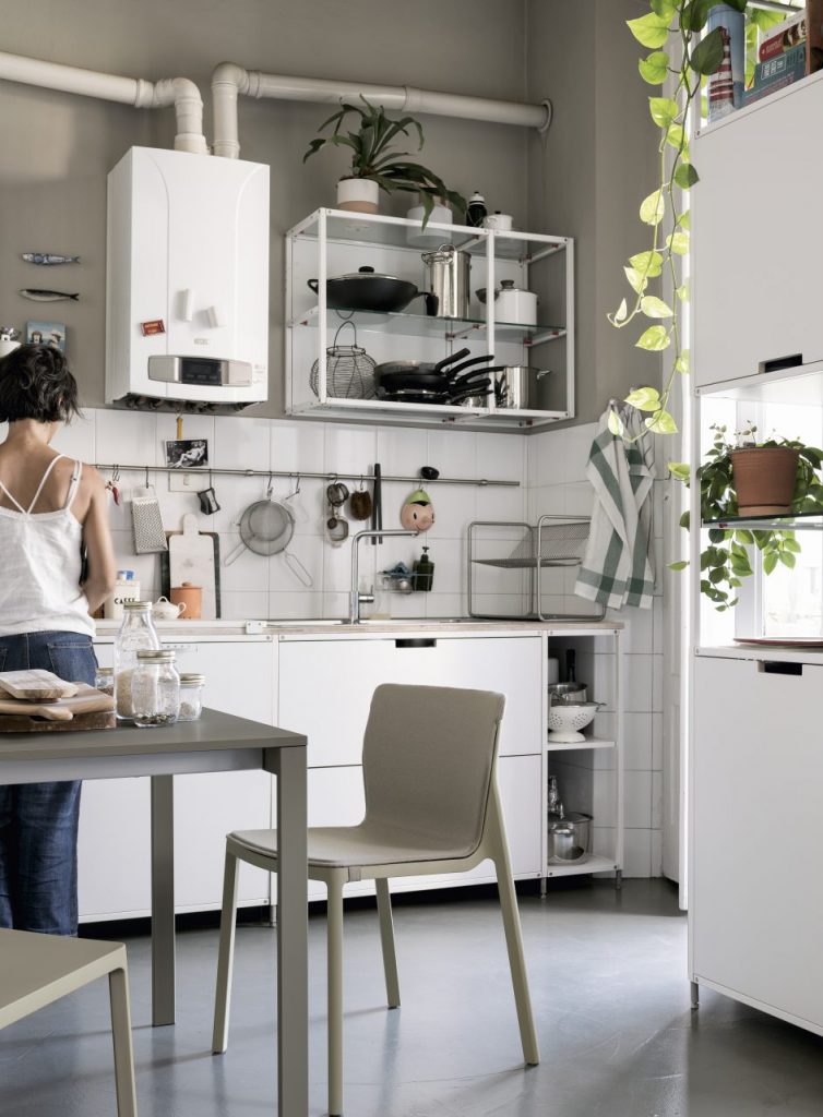 chairs made of molded polypropylene and removable cushions in a tone of gray and light gray