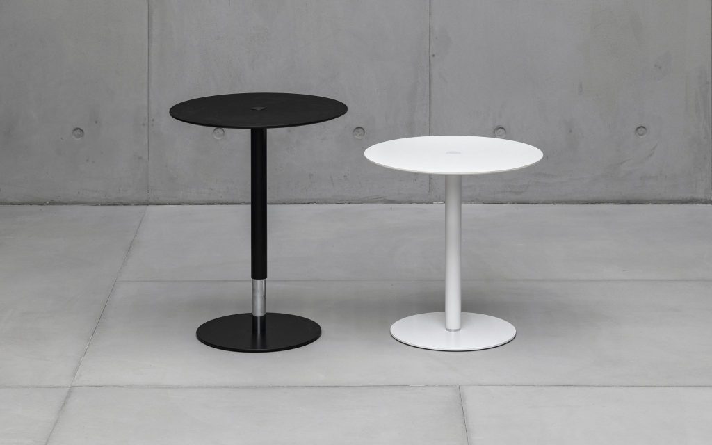 two adjustable centerpieces with a single button made of wood and metal base in a tone of white and black