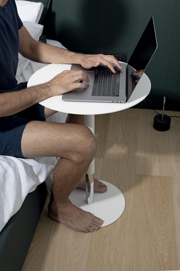 side table made of wood and aluminum base in a white tone with adjustable button