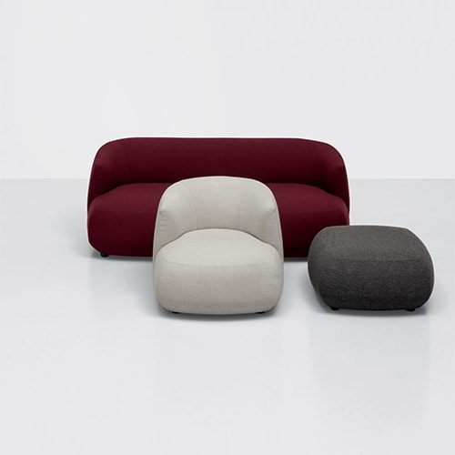 three sofas made of wood and fabric in a gray, white and red tone