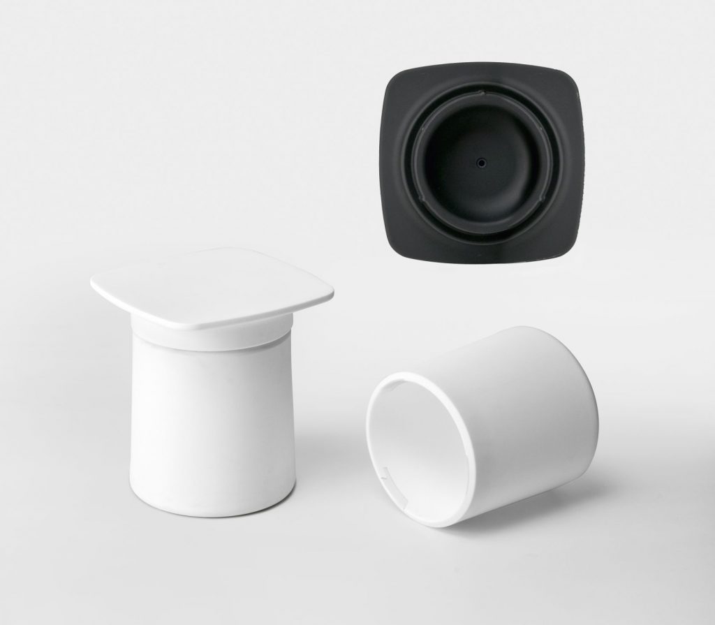 nightstand with internal drawer made of polypropylene base in the shape of a wine lid in black and white tones