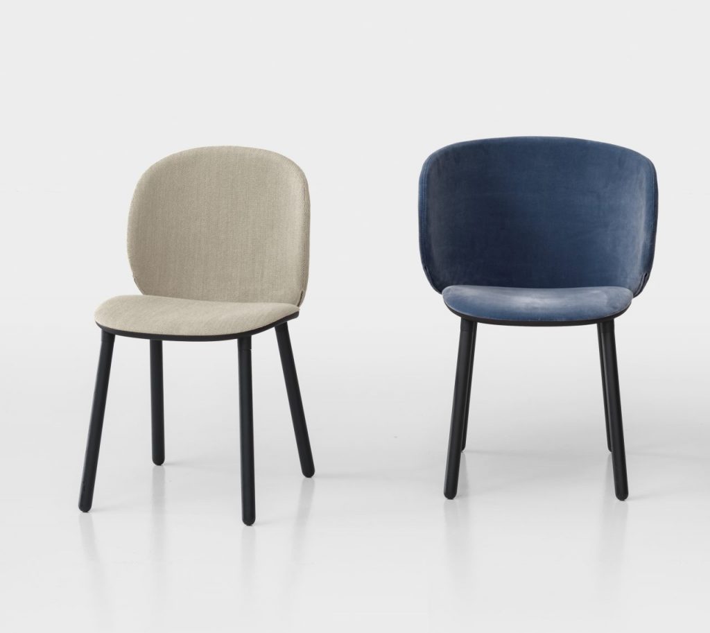 two chairs made of fabric in a beige and blue tone on wooden legs on a white background