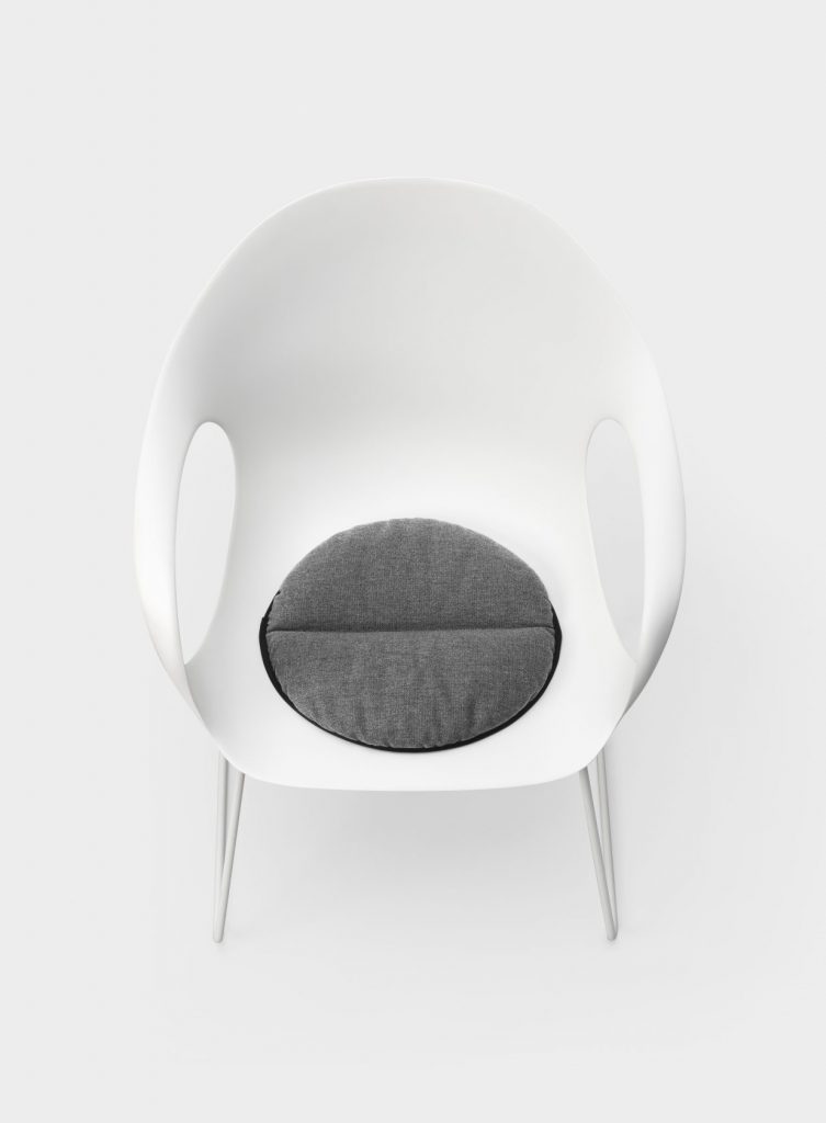 chair with fabric cushion implemented in its structure made of polyurethane in a white and gray color tone