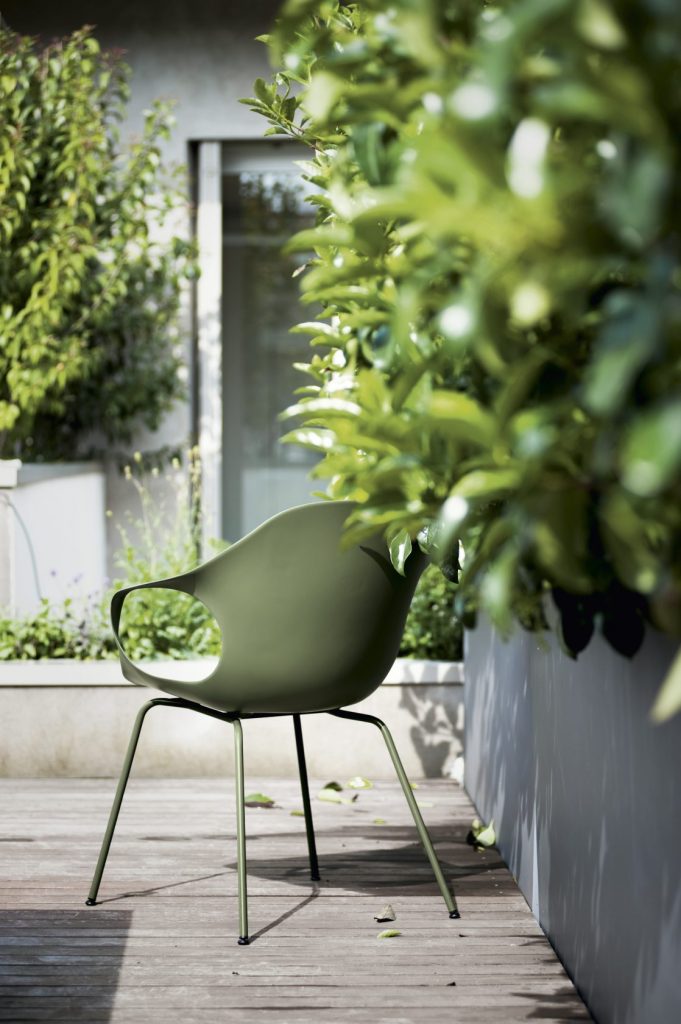 chair made of polyurethane and metal leg base in a green tone