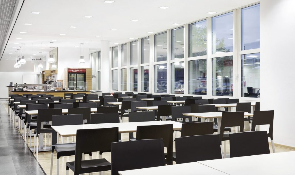 line of chairs made of polyurethane throughout its structure in a black tone