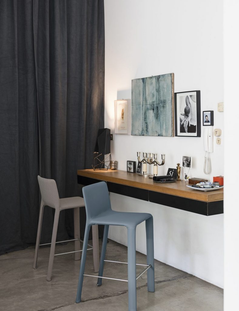 two chairs made of blue and gray fabric on an aluminum structure
