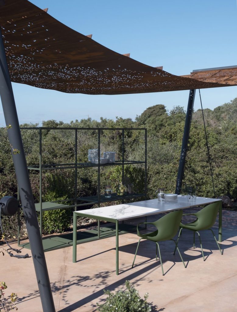 dining table made of aluminum base and glass top in a white tone