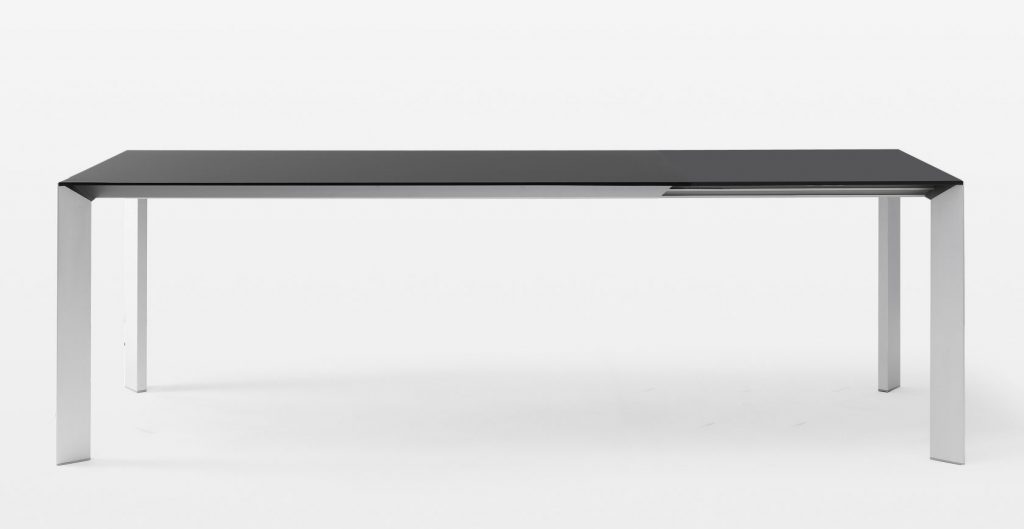 extendable table made of metal and aluminum in a black and gray tone on a white background