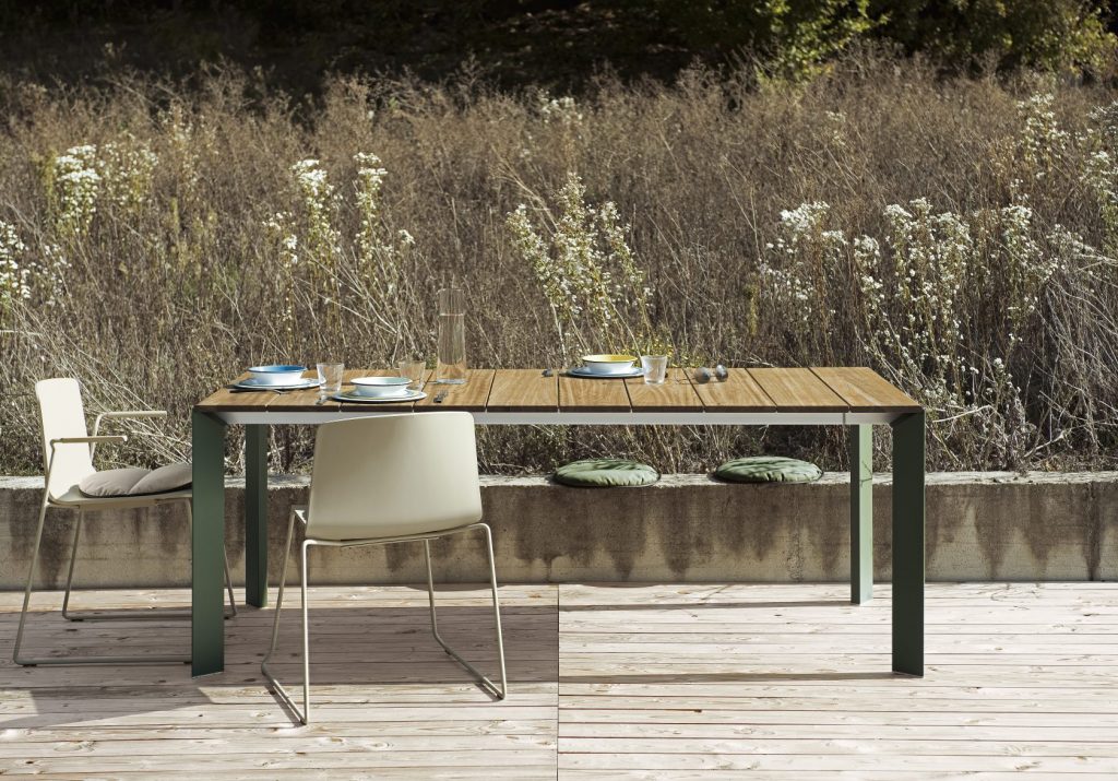 dining table made of metal or wood base and aluminum top in a gray coffe tone