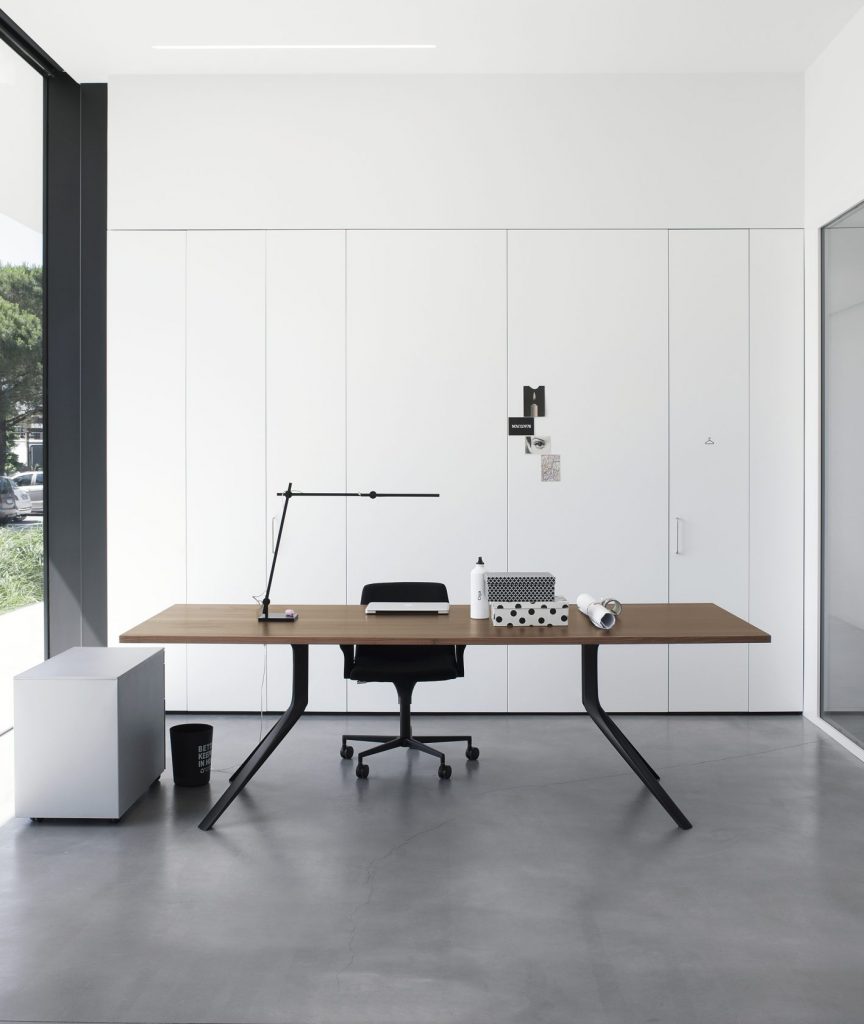 desk table with two-legged aluminum base in a black tone and coffee lacquered top