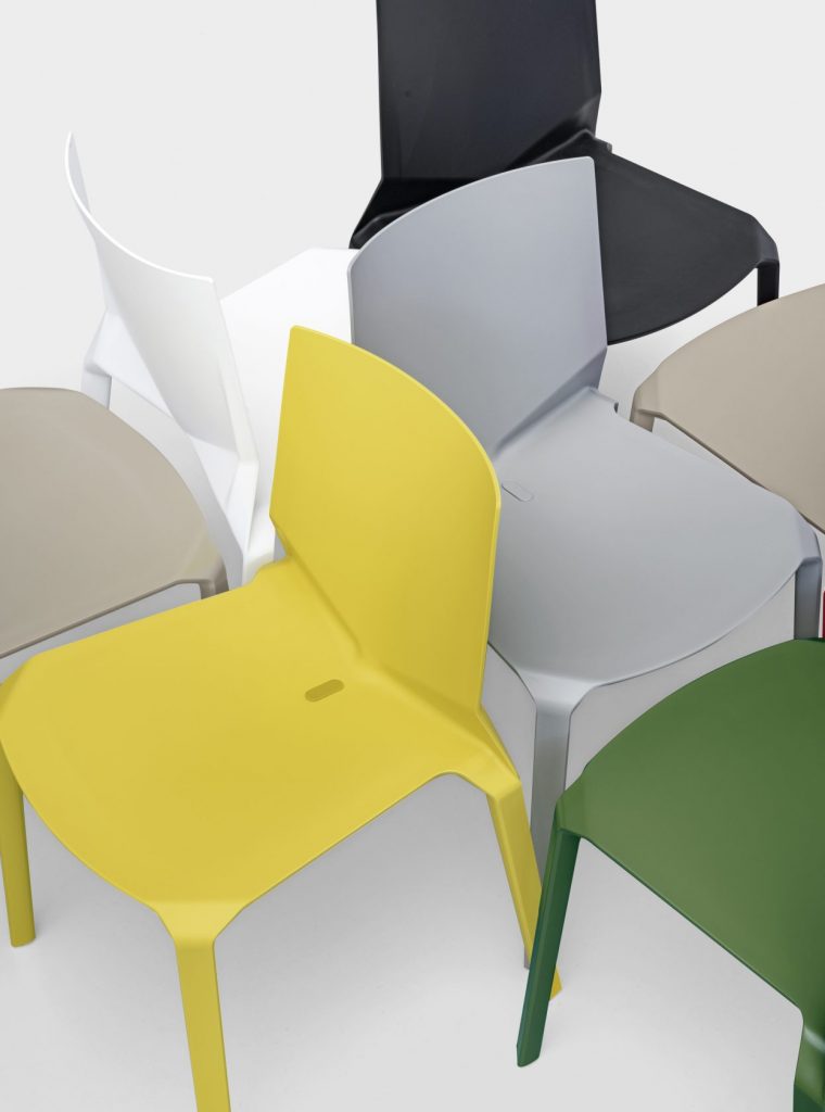 seven chairs made of polypropylene throughout its structure in shades of green, white, gray, yellow, beige and black