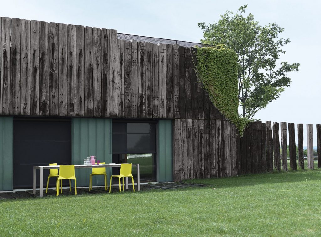 two chairs made of polypropylene in shades of yellow on the outside
