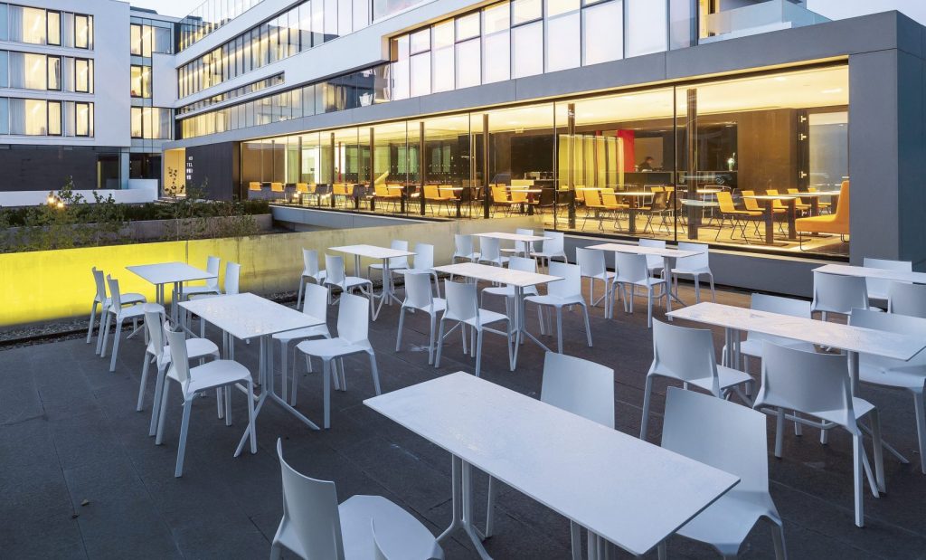 line of white chairs made from polypropylene in shades of white