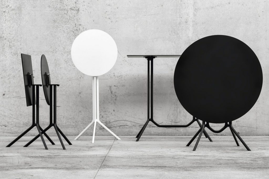 four side tables made in different shapes based on aluminum in black and white tones
