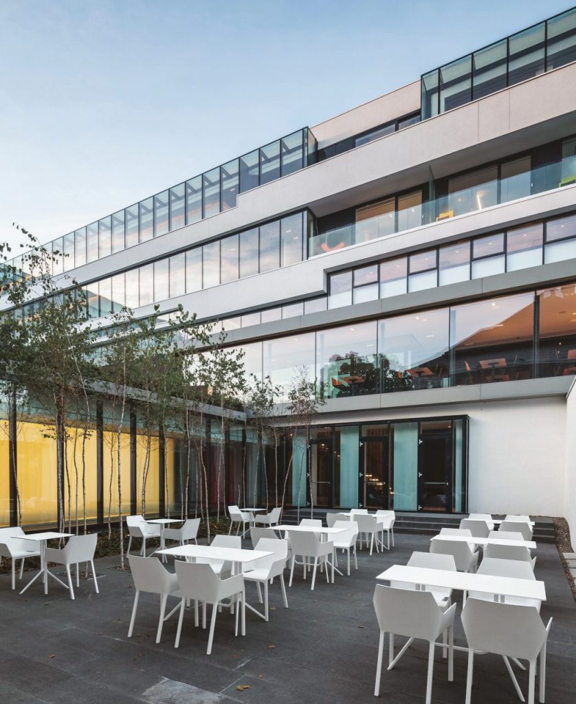 line of auxiliary tables made of white aluminum base in rectangular shape