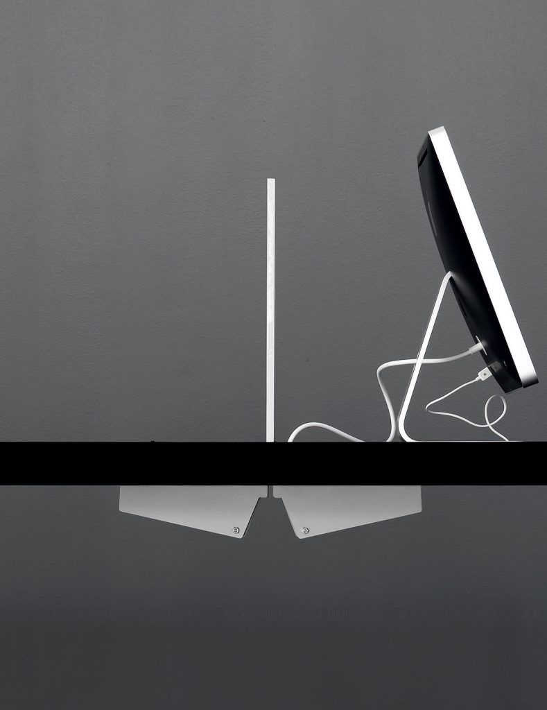 office desk table made of aluminum base in different layers in a white tone