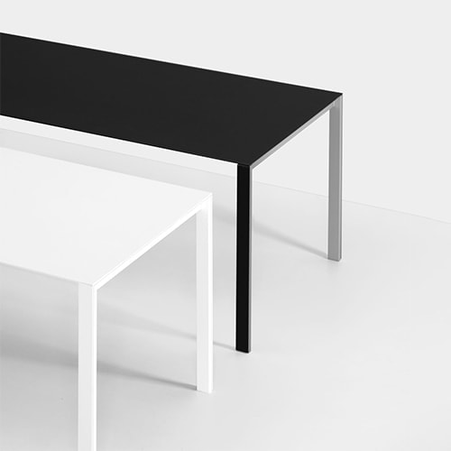 two table made of metal base and aluminum top in rectangular shape in a black and white color tone